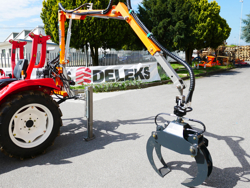 gru forestale idraulica con pinza per legna montata su trattore mod crab 3000